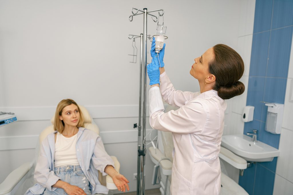 Doctor is checking the Drip 